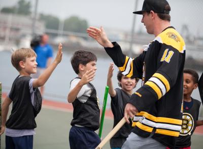 Jimmy Hayes back in town: The newest member of the Boston Bruins greeted kids at Puopolo Park in Boston's North End on Wed., July 8. Photo by Paige Brown/Boston Bruins 
